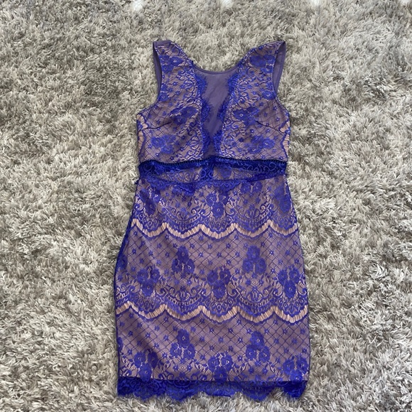 Lush Dresses & Skirts - 😱price drop😱NWOT lush lace dress with see thru peekaboos